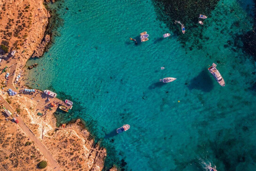 aerial view of blue sea water near island