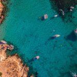 aerial view of blue sea water near island
