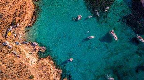 aerial view of blue sea water near island