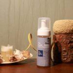 Foaming cleanser bottle with natural elements